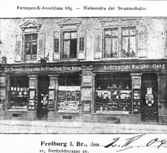 Postkarte mit Buchhandlung in Freiburg im Breisgau als Motiv